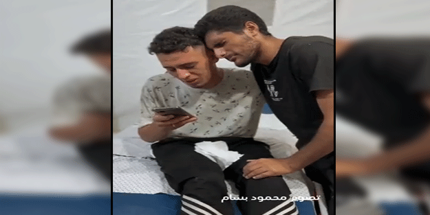 Tüm ailesi şehit edilen Filistinli genç duygulandırdı! Acısını Kur'an'a sarılarak teskin etti