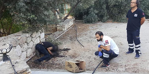 Tuvaletin çatısında elleri ve yüzü yanmış şekilde bulundu