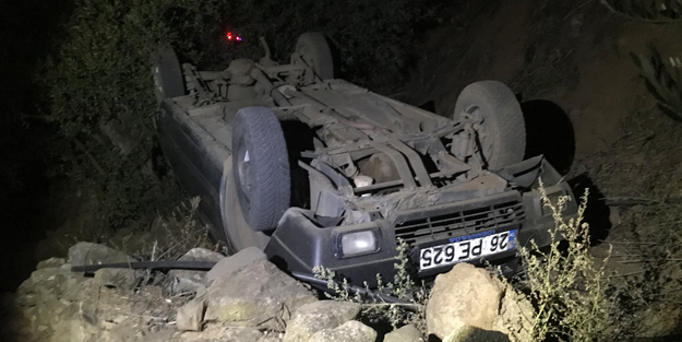 Uçuruma yuvarlanıp ters dönen araçtan yaralı kurtuldular