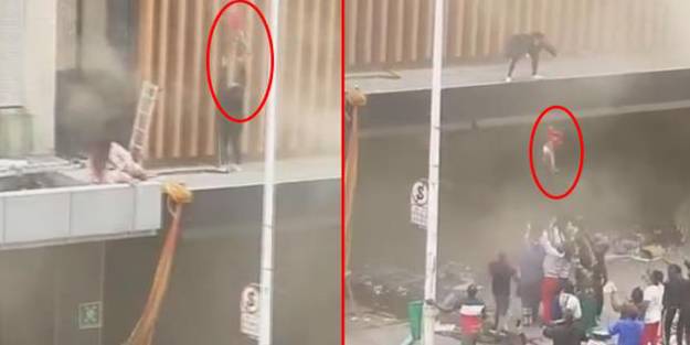 Ülke savaş alanına döndü! Yağmacıların ateşe verdiği binadan bebeğini atarak kurtardı