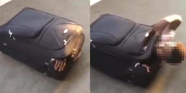 Ülkeye giriş yapmak için valize öyle bir girmiş ki...