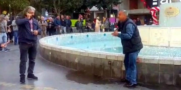 Üzerine benzin döküp meydanda intihara kalkıştı