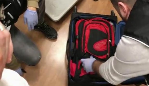 Valiz açıldı ve içinden 