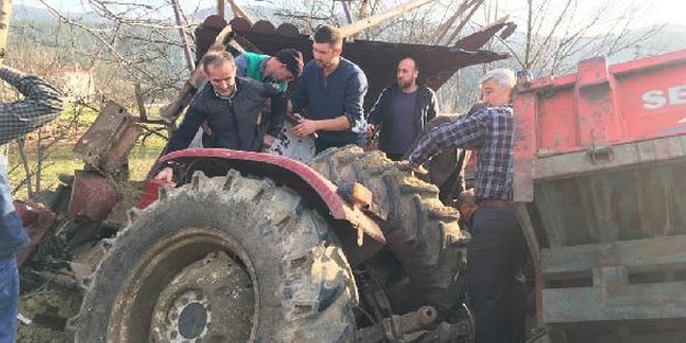 Virajı alamayan traktör devrildi: 2 yaralı