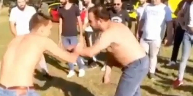 Vurdumduymazlığın bu kadarı! Koronavirüs salgınını umursamayan gençler ormanda güreş tuttu