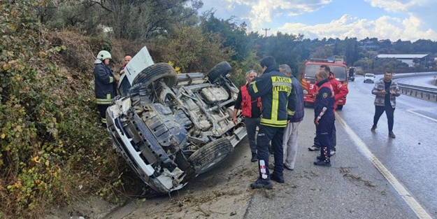 Yan yatan kamyonetten burnu bile kanamadan çıktı
