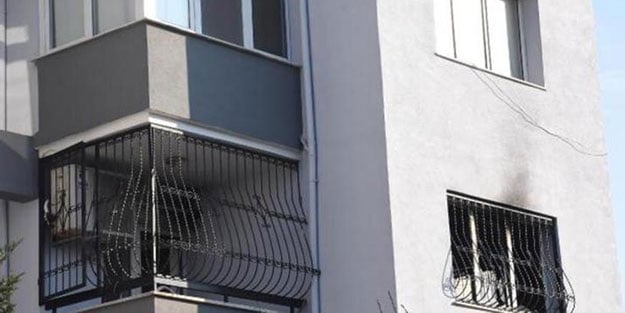 Yanan dairedeki aileyi, komşularının yardımı kurtardı