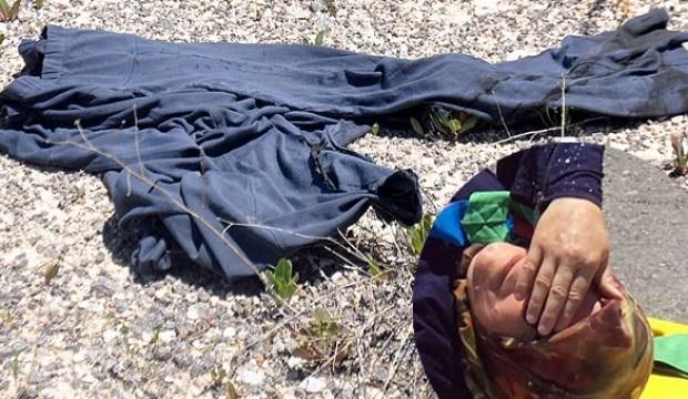 Yaralı eşini yerde öylece bıraktı! Bakın ne almaya gitti