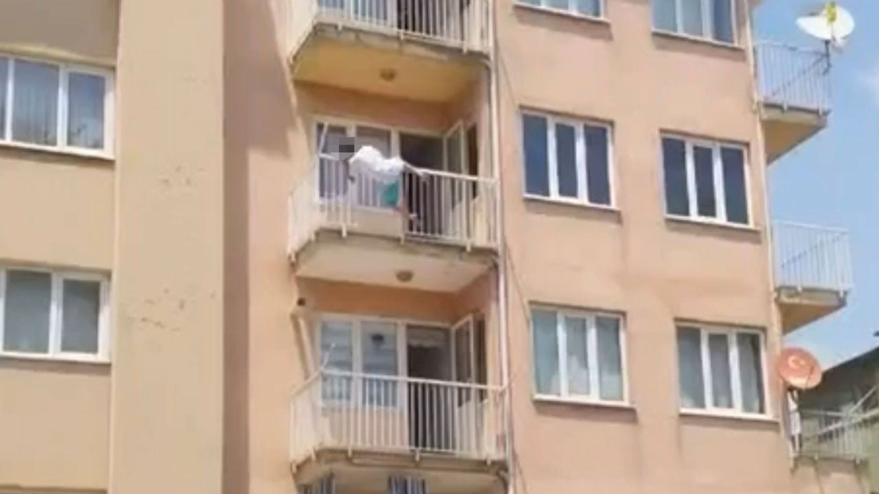 Yarı çıplak halde sokağa çıkmıştı! Herkesin gözü önünde balkondan atladı
