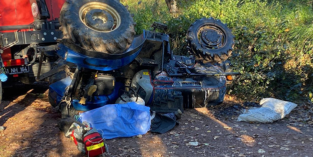 Yaşlı adam devrilen traktörün altında can verdi!