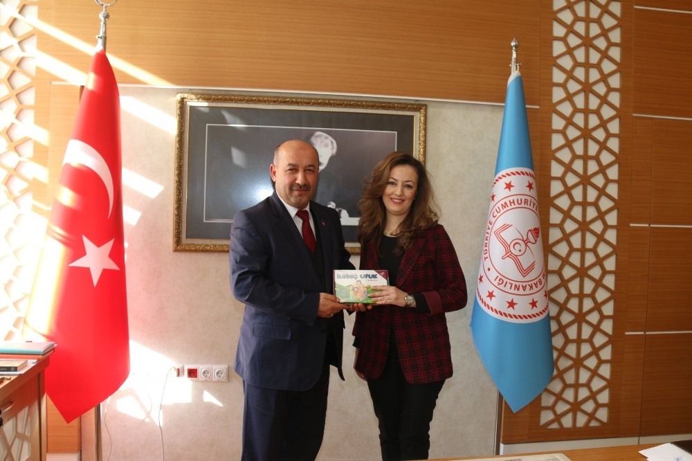 Yazar ögretmenden Müdür Başyiğit’e ziyaret 