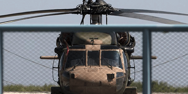 Yunanistan’a inan helikopter ile ilgili flaş ayrıntı: Belinde silah vardı, evrakları yaktı…