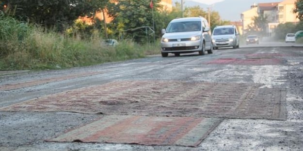 Zonguldak'ta yoldaki toza halılı çözüm
