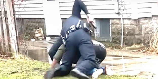 Zulüm sürüyor: ABD polisi, siyahi bir gencin ensesine sıktı!