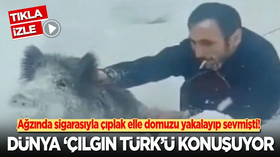 Ağzında sigarasıyla çıplak elle domuzu yakalayıp sevmişti! Çılgın Türk dünyanın gündeminde