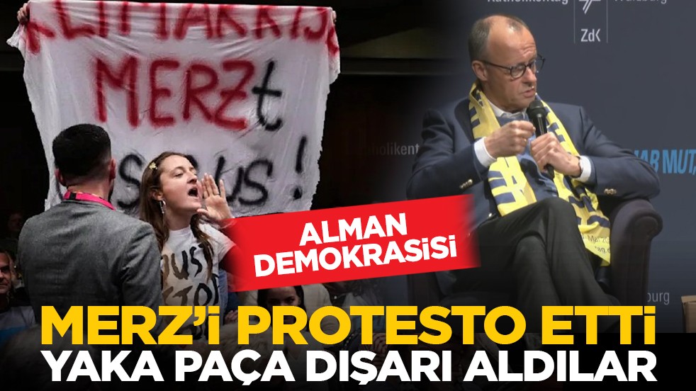 Alman demokrasisi: Merz’i protesto etti yaka paça dışarı aldılar