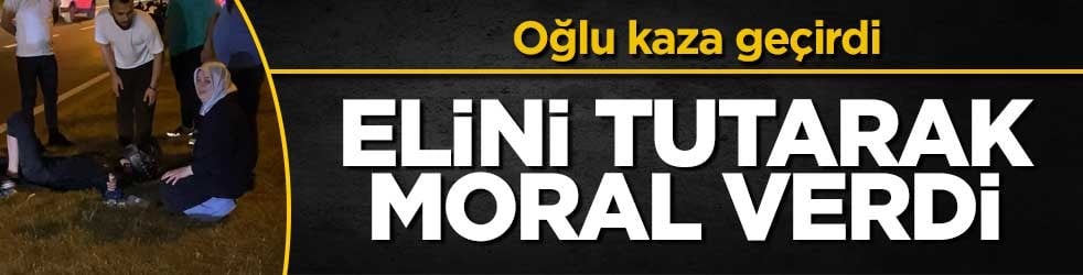 Anne, yaralı oğlunun elini tutarak moral verdi