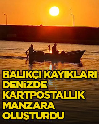 Balıkçı kayıkları denizde kartpostallık manzara oluşturdu