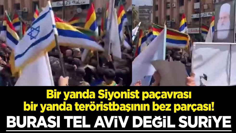 Bir yanda Siyonist paçavrası, bir yanda teröristbaşının bez parçası! Burası Tel Aviv değil Suriye