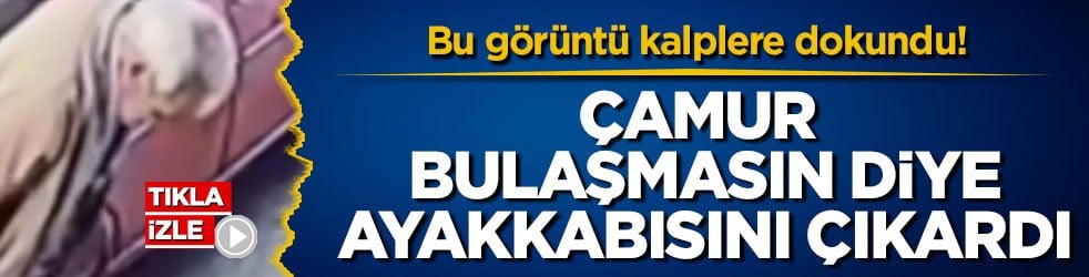 Bu görüntü kalplere dokundu! Çamur bulaşmasın diye ayakkabısını çıkardı