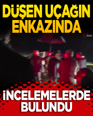 Düşen uçağın enkazında incelemelerde bulundu