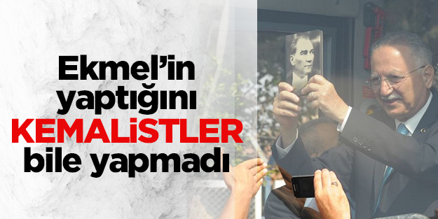 Ekmel Atatürk'ü anlatan kitabı öpüp başına koydu