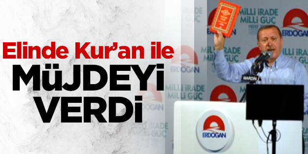  Elinde Kur'an ile müjdeyi verdi