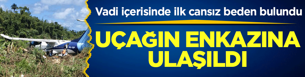 Endonezya'da kaybolan uçağın enkazına ulaşıldı: Vadi içerisinde ilk cansız beden bulundu