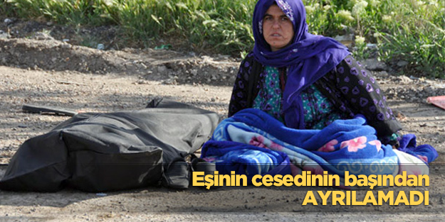 Eşinin cesedi başından ayrılamadı