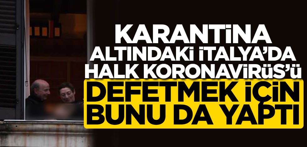 Evlerinden çıkamayan halk pencerelerde şarkı söylüyor