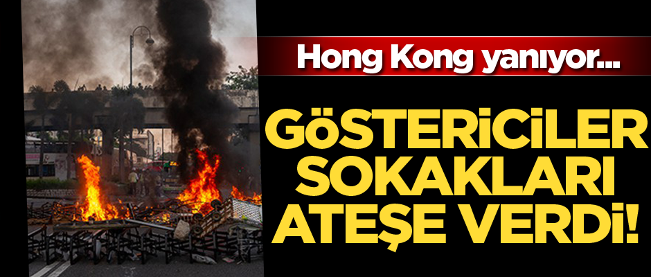 Hong Kong'da göstericiler sokakları ateşe verdi