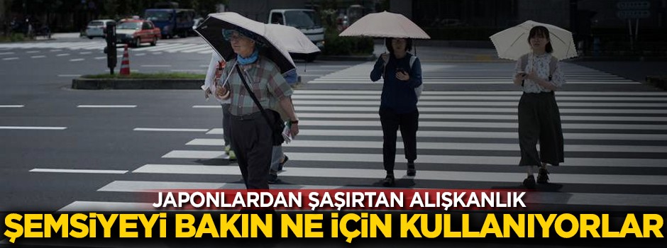 Japonlardan şaşırtan alışkanlık! Şemsiyeleri bakın ne için kullanıyorlar