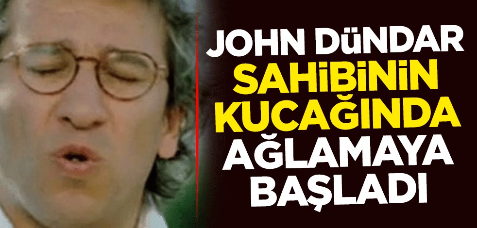 John Dündar sahibinin kucağında ağlamaya başladı