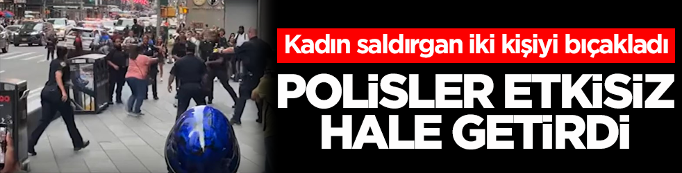 Kadın saldırgan iki kişiyi bıçakladı! Polisler etkisiz hale getirdi