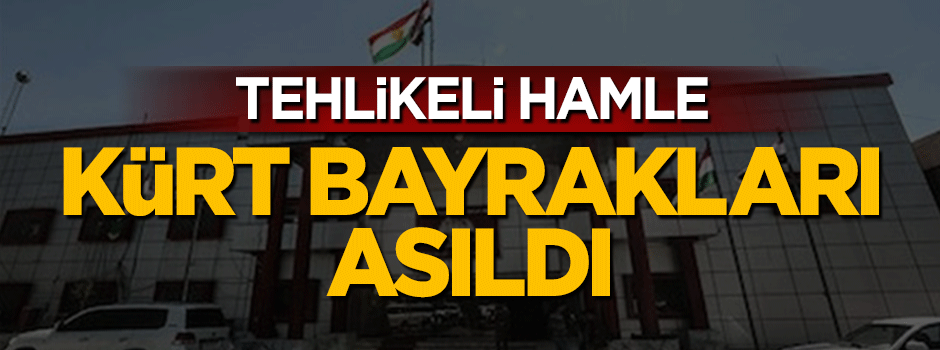 Kerkük'te bütün hükümet binalarına Kürt bayrakları asıldı