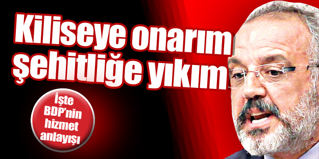 Kiliseye onarım şehitliğe yıkım