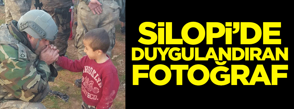 Komutan üşüyen çocuğu ısıttı