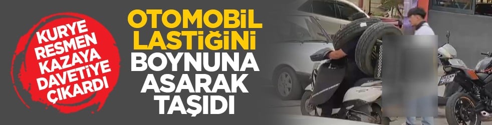 Kurye resmen kazaya davetiye çıkardı: Otomobil lastiğini boynuna asarak taşıdı