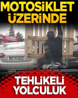 Motosiklet üzerinde tehlikeli yolculuk