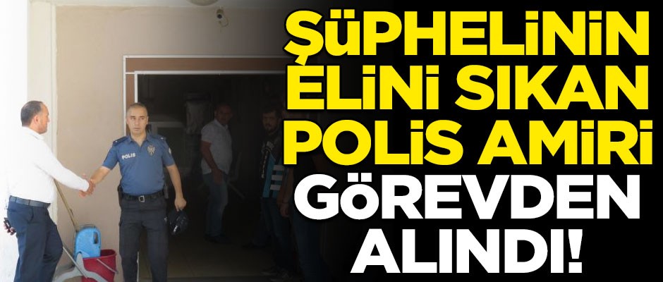 Polis merkezi önünde şüphelinin elini sıkan amir görevden alındı
