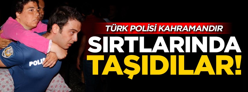 Polisten kahramanlık örneği! Sırtlarında taşıdılar
