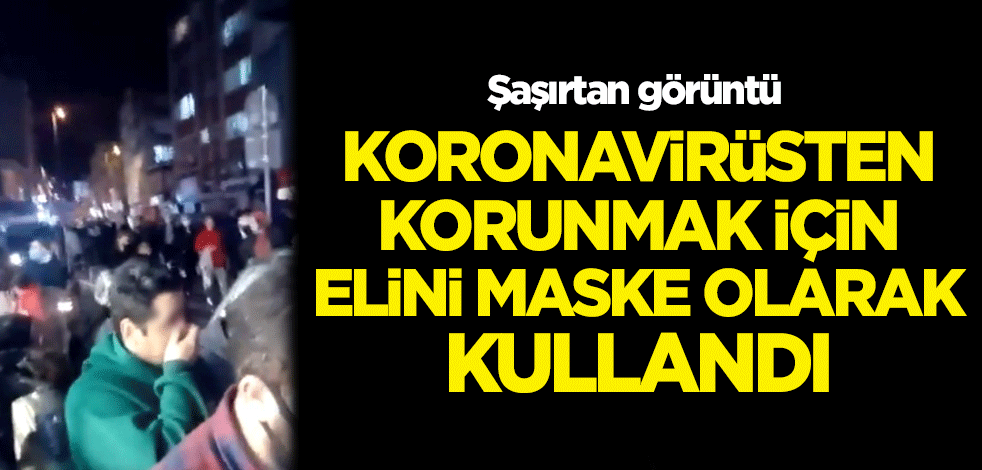 Şaşırtan görüntü! Koronadan korunmak için elini maske olarak kullandı