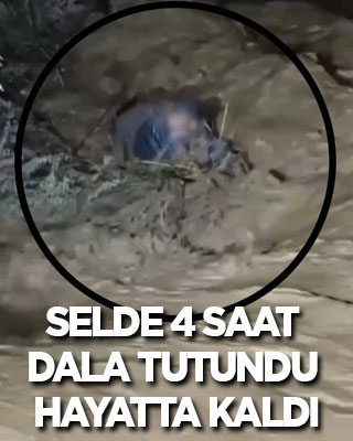 Selde 4 saat boyunca dala tutunarak hayatta kaldı