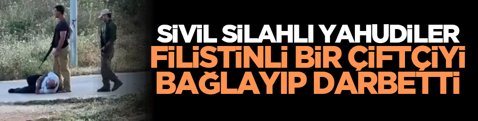 Sivil silahlı Yahudiler Filistinli bir çiftçiyi bağlayıp darbetti