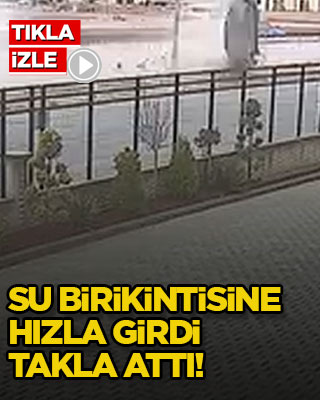 Su birikintisine hızla girdi, takla attı!