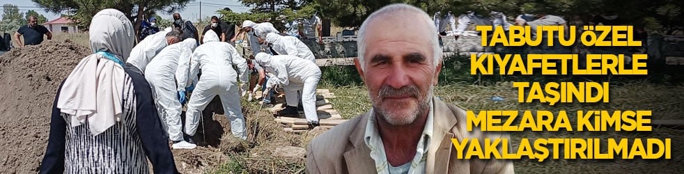 Tabutu özel kıyafetlerle taşındı, mezara kimse yaklaştırılmadı