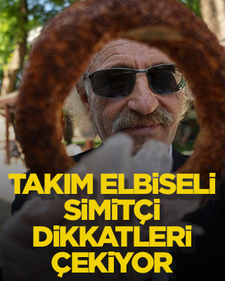 Takım elbiseli simitçi dikkatleri çekiyor