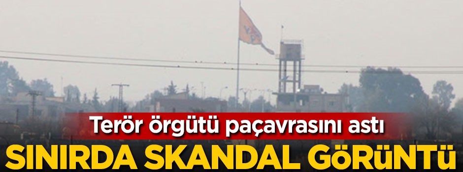 Terör örgütü paçavrasını astı, sınırda skandal görüntü