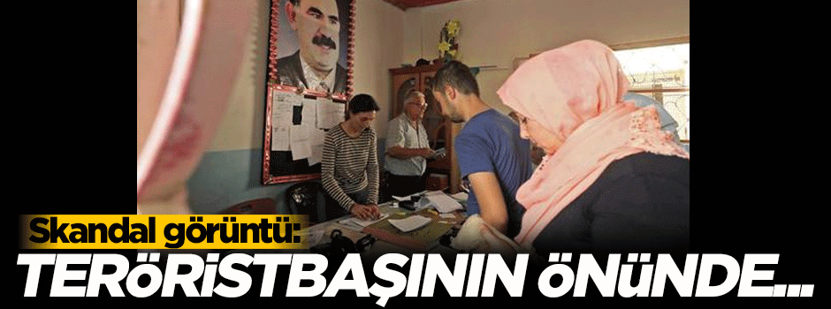 Teröristbaşının posterinin önünde oy kullandılar!
