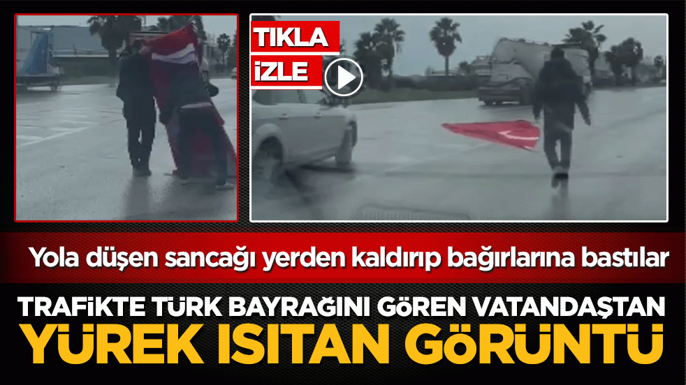 Yola düşen Türk bayrağı için duyarlı davranış: Sancağı yerden kaldırıp bağırlarına bastılar!